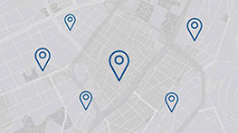 แผนที่ที่มีพื้นที่สีขาวและเครื่องหมายตำแหน่งสีน้ำเงิน.